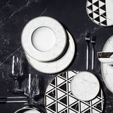 Elegant and classic dinnerware collection inspired by marble and decorated with gold. Timeless dinner plate design for your table.