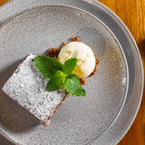 Stoneware dinnerware collection with natural glaze. An informal yet eclectic stoneware plates will add a hand-crafted look to each dinner table.