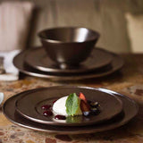Stoneware dinner set with metallic radiance.