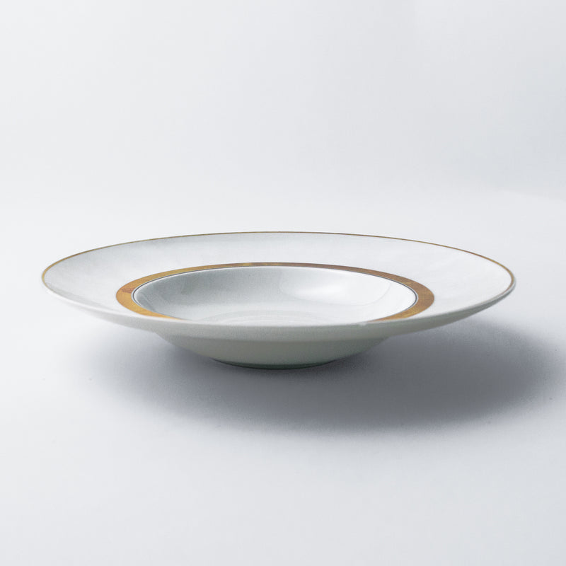 Soul plate. Past bowl. Elegant and luxurious white dinnerware set with gold rim.