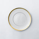 Bread and butter plate. Elegant and luxurious white dinnerware set with gold rim.