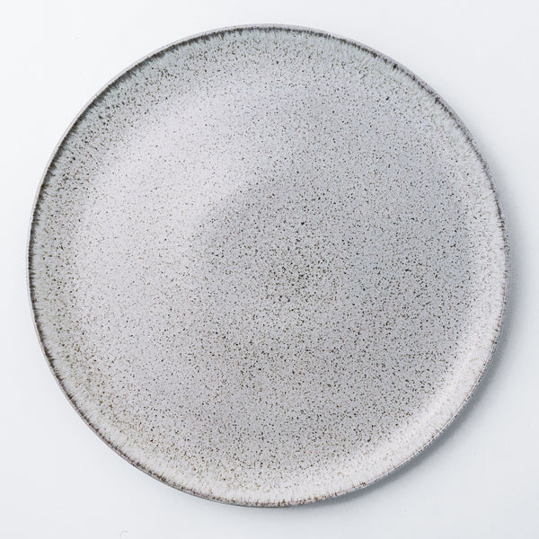 Charger plate. Stoneware dinnerware collection with natural glaze. An informal yet eclectic stoneware plates will add a hand-crafted look to each dinner table.