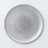 Dinner plate. Stoneware dinnerware collection with natural glaze. An informal yet eclectic stoneware plates will add a hand-crafted look to each dinner table.
