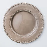 Charger plate. Universal yet exciting ceramic dinnerware, perfect for livening up your everyday table.